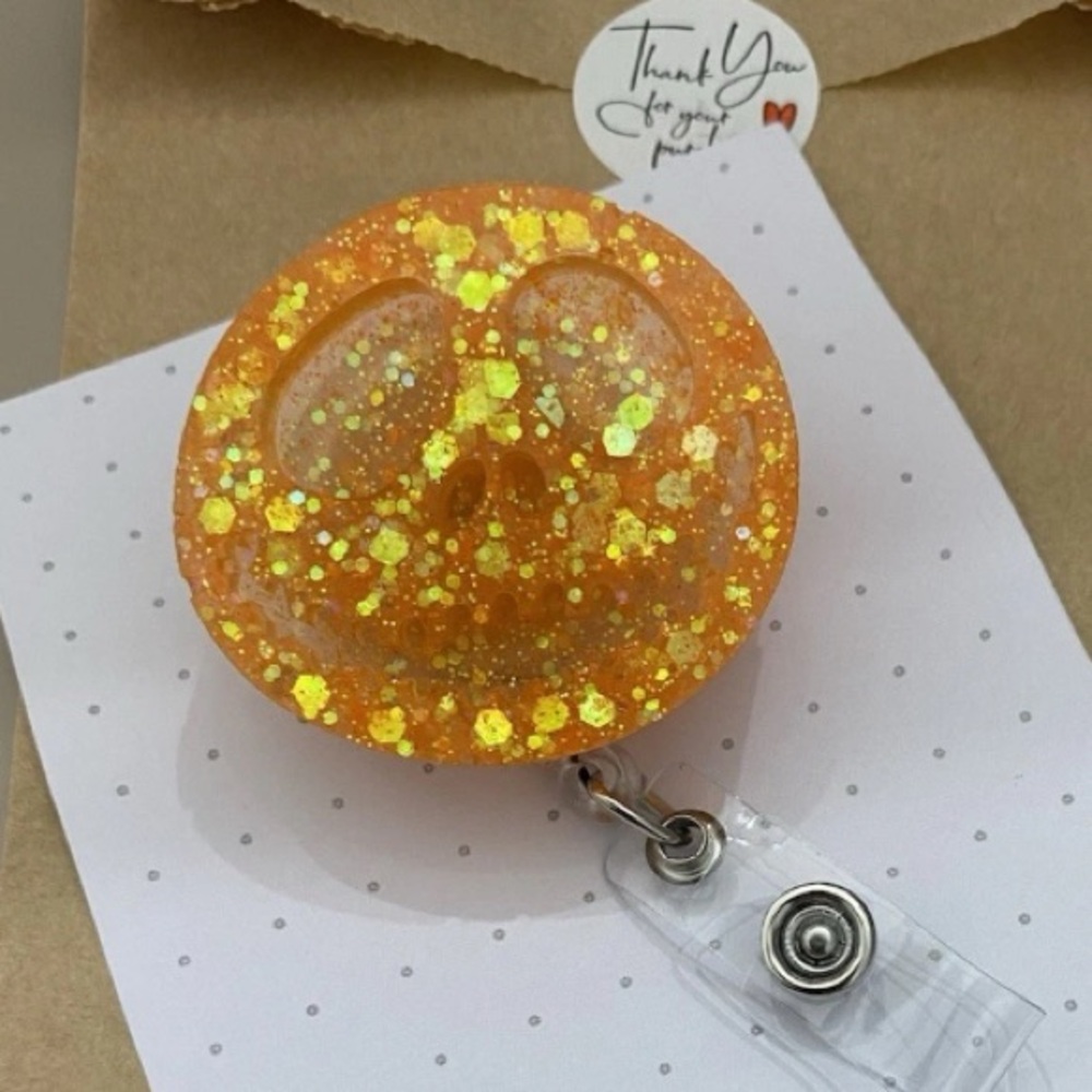 Glittery Orange Holiday Decor Badge Reel